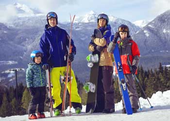 A-Happy-family-enjoying-Powder-Alliance-Pass-and-skiing